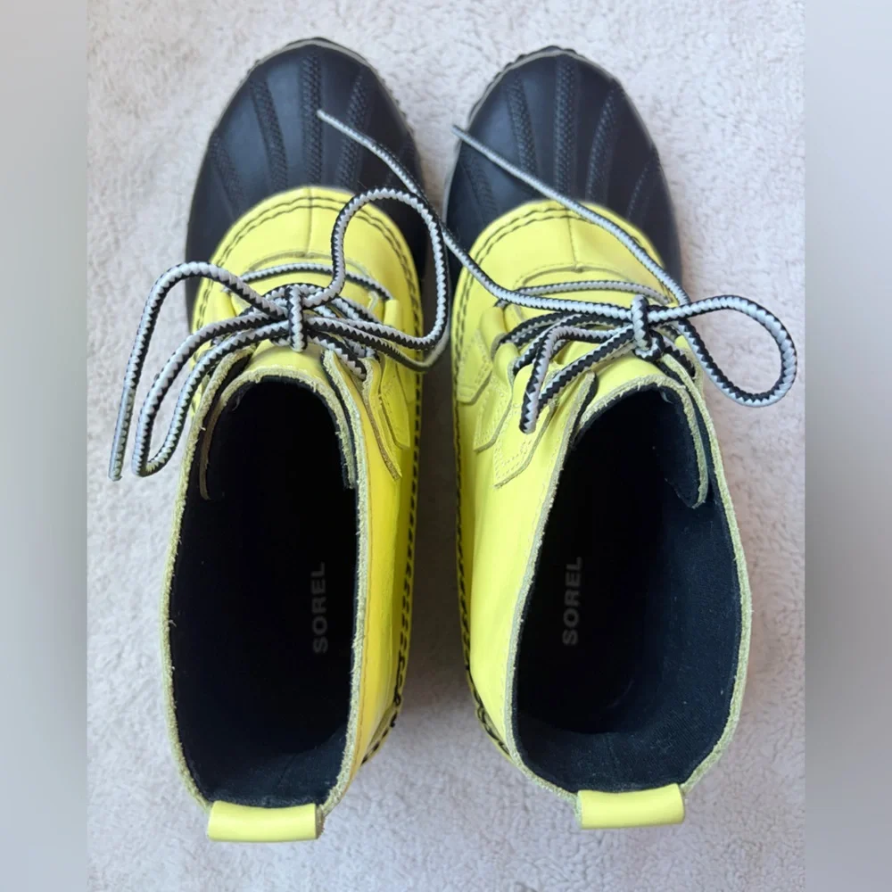 Sorel Out And About Yellow and Black Winter or Rain Boots Women Size 9